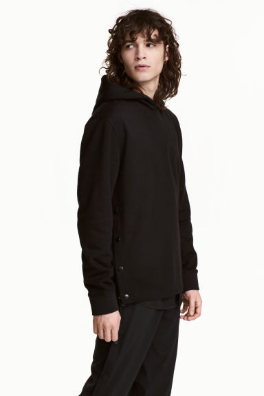 Hooded top with press-studs